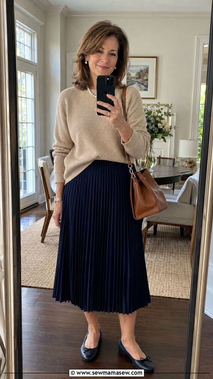 Beige Sweater and Navy Pleated Midi Skirt - 35 Old money outfits for women over 50