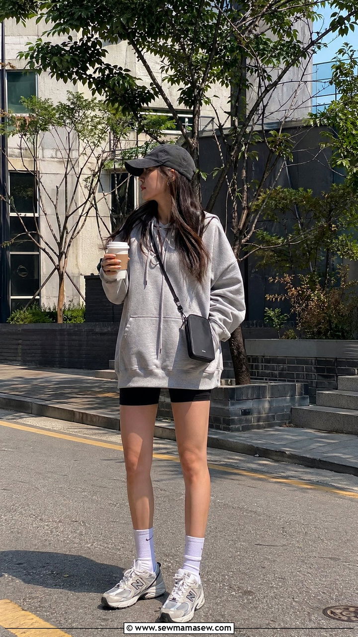 Oversized hoodie with biker shorts - 35 Seoul vacation outfit ideas