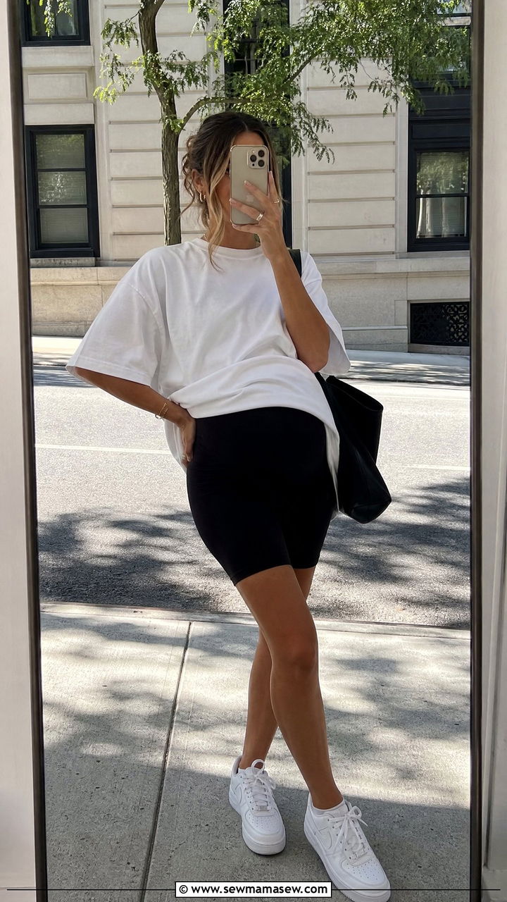 Biker Shorts With An Oversized Tee And White Sneakers - 30 summer outfits for pregnant women
