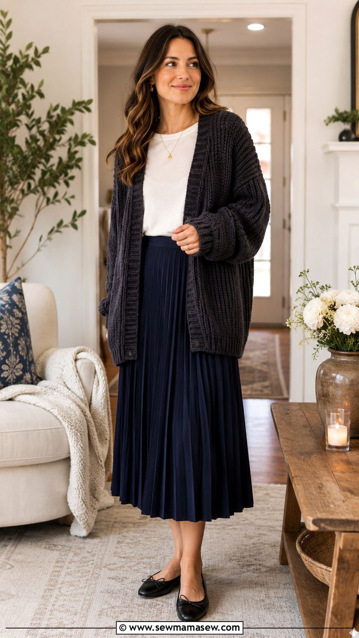 Chunky Charcoal Cardigan With Navy Pleated Midi Skirt - 20 Quiet luxury outfit ideas Gwyneth Paltrow
