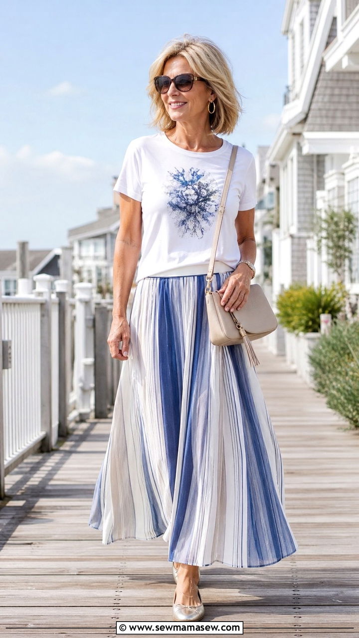 Graphic Tee With Striped Maxi Skirt and Metallic Flats - 40 Spring outfit ideas for women over 50 2026