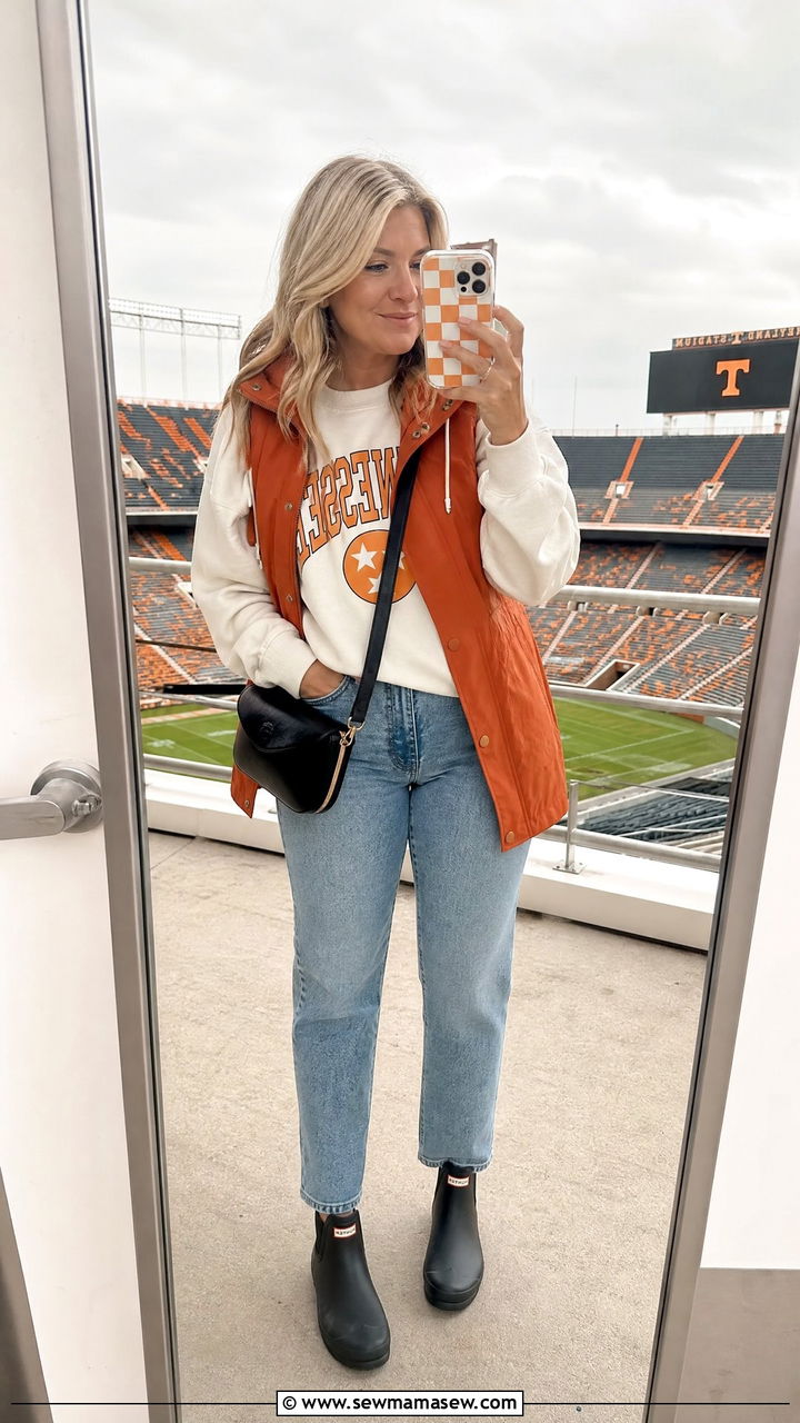 Rain Vest Over A Team Sweatshirt And Straight Leg Jeans - 25 Gameday outfit ideas rainy weather